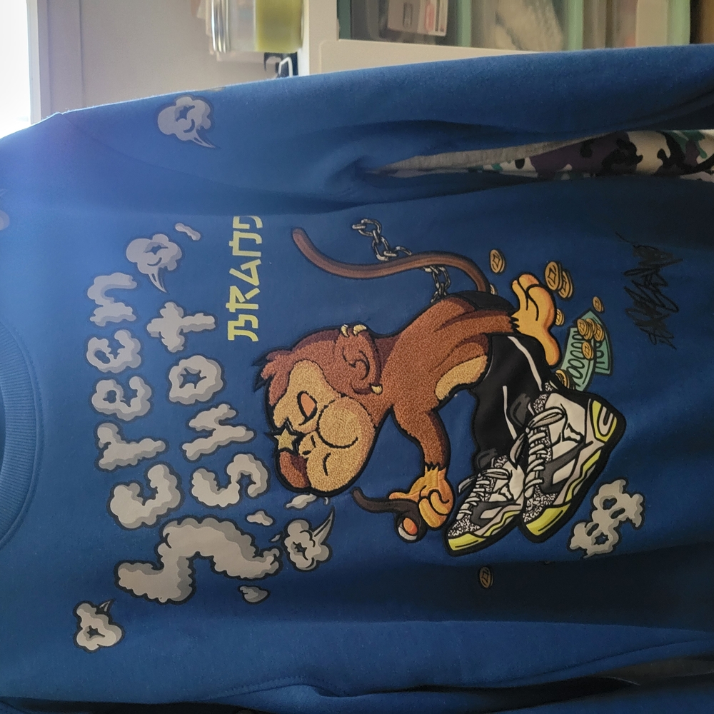 Blue Graphic Sweatshirt with Monkey Design